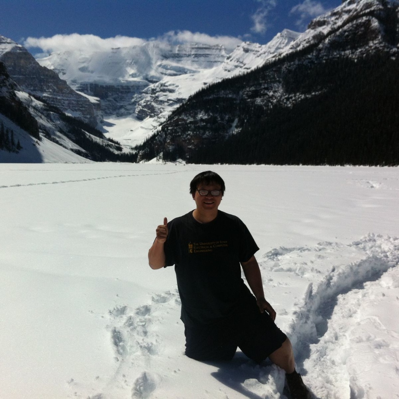 Weiyu Xu in Calgary hiking on top of frozen Lake Louise